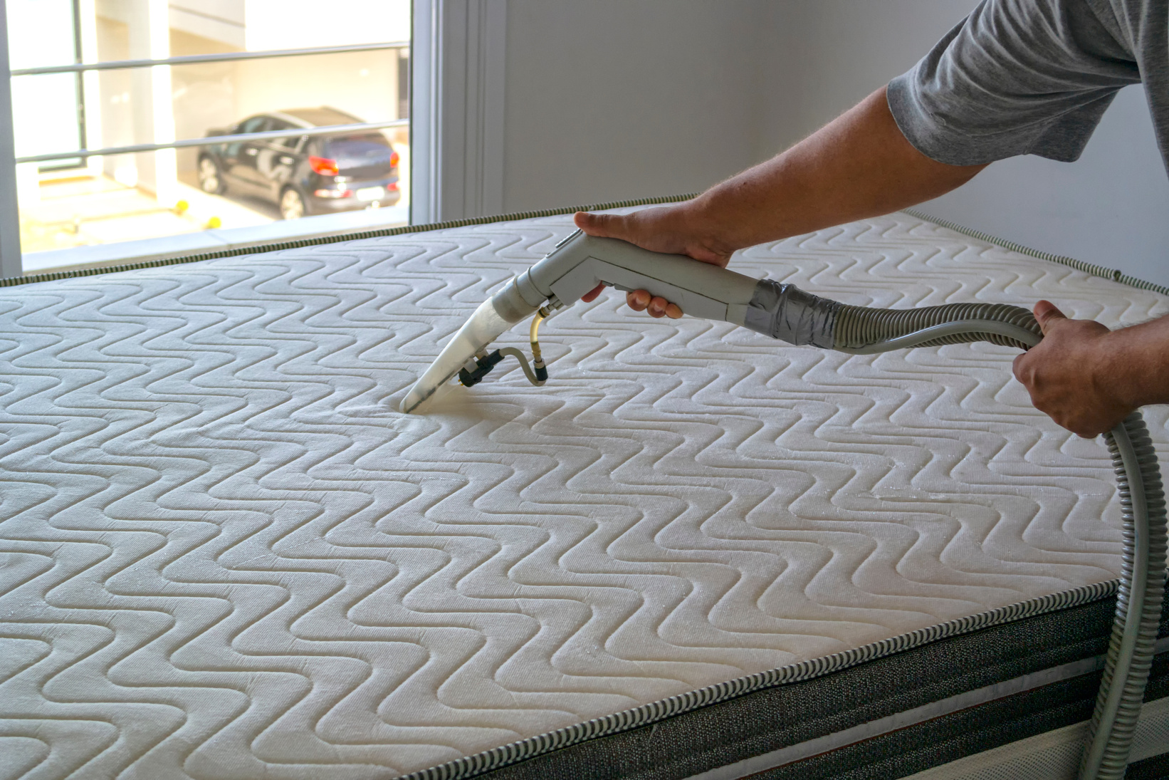 Cleaning the mattress.